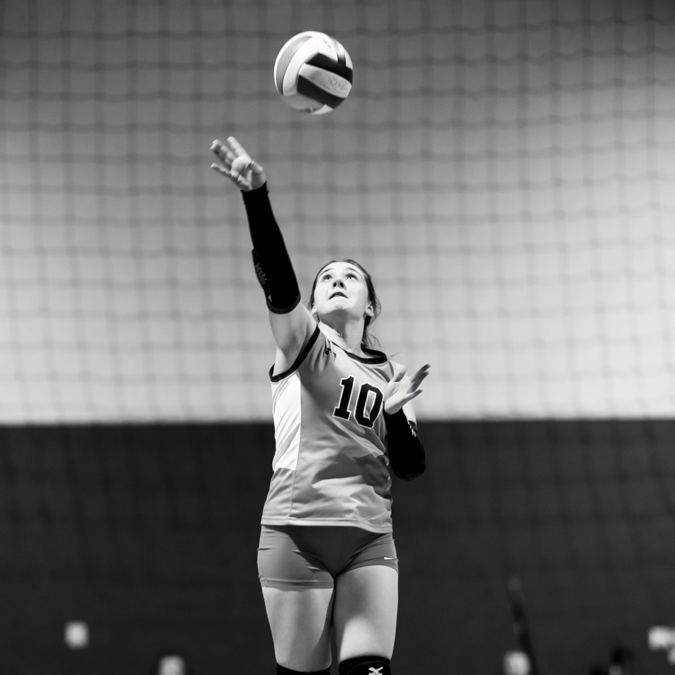 Girl jumping for volleyball Girl jumping for volleyball