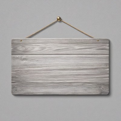 Wooden sign hanging on wall