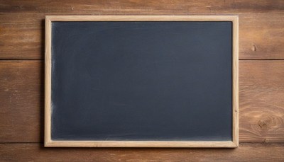 Blank chalkboard on wood background