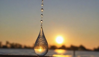 Water drop at sunset