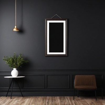 Black wall with framed picture and chair