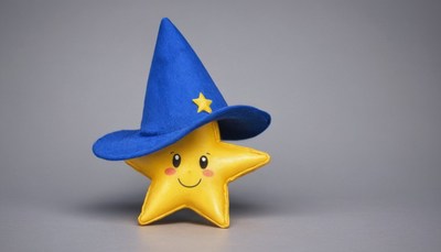 Smiling star wearing a blue hat