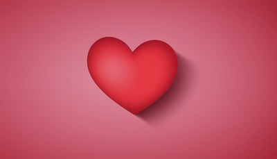 Red heart on pink background