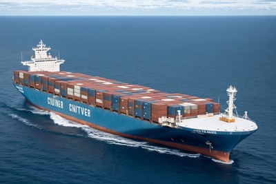 Container ship sailing on open water