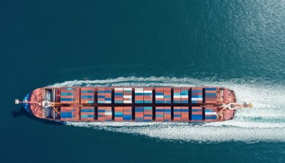 Cargo ship sailing on open water