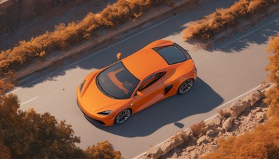Orange sports car on winding road