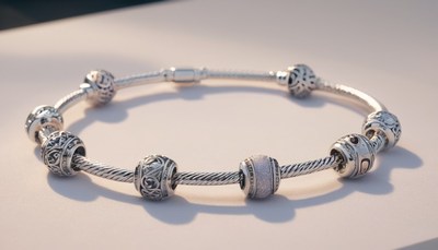Silver charm bracelet with intricate designs