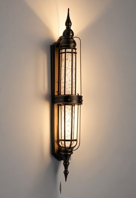 Ornate wall sconce with glass shade