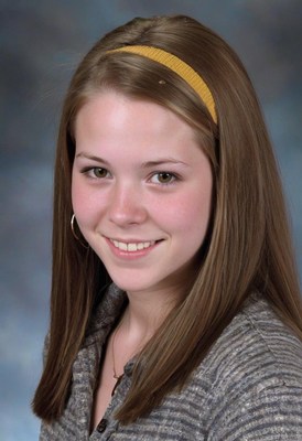 Young woman smiling with yellow headband