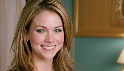 Woman smiling indoors