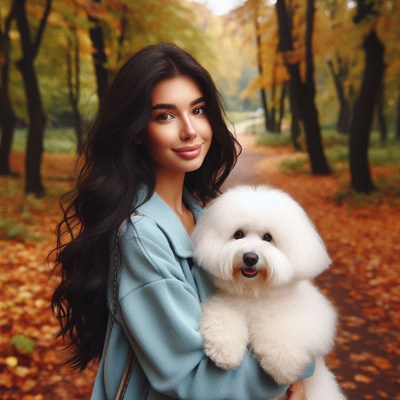 Woman holding white dog in autumn park