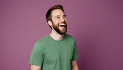 Man laughing in green t-shirt