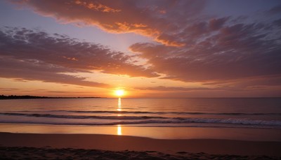Sunset over beach waves