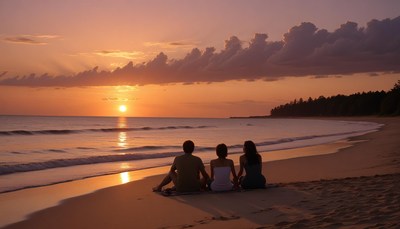 Friends watching sunset on beach