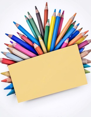 Colored pencils around blank notecard