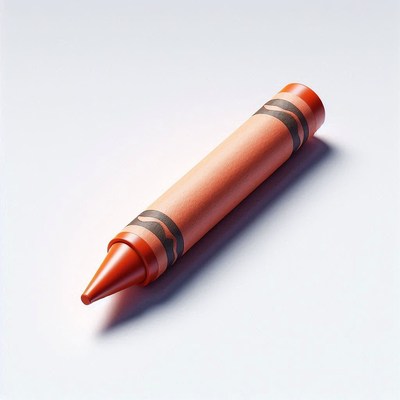 Orange crayon on white surface