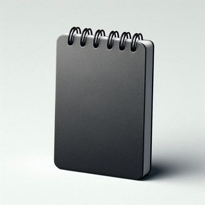 Black spiral notebook on white background