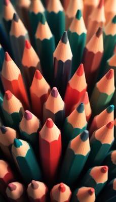 Colorful pencils arranged in a spiral pattern