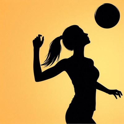 Silhouette of woman playing volleyball at sunset