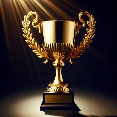 Golden trophy shining under spotlight