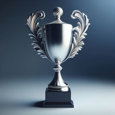 Silver trophy displayed against dark background
