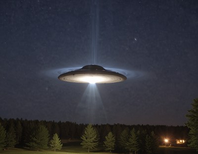Ufo hovering over forest at night