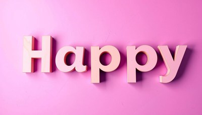 Happy text on pink background