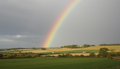 Rainbow over a rural landscape