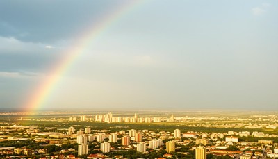 Rainbow over cityscape