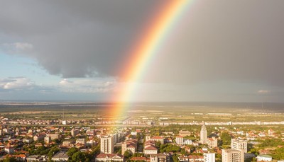 Rainbow over a city