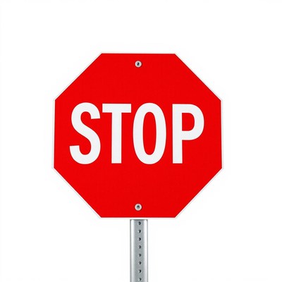 A red stop sign stands against a white background