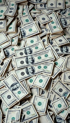 A pile of hundred dollar bills