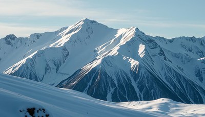 Snowy mountain range on a bright, winter day