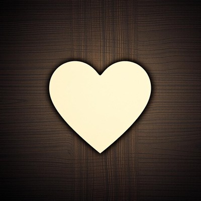 A white heart on a wooden background
