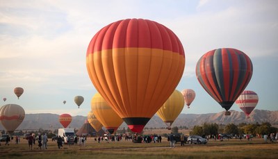Hot air balloons take flight in the morning