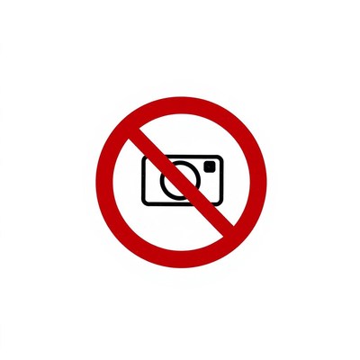 A no photography sign is shown