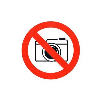 A red circle with a diagonal line through a camera icon