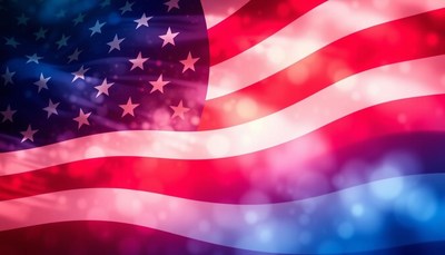 The american flag waves proudly in the wind