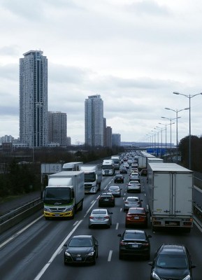 A traffic jam on a highway in a city