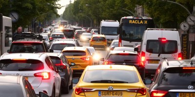Cars are stuck in traffic on a city street