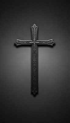 A black cross hangs on a dark wall