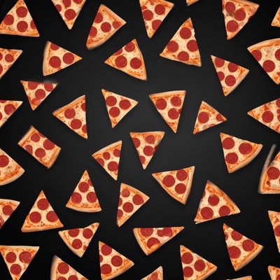 Pepperoni pizza slices on a black background