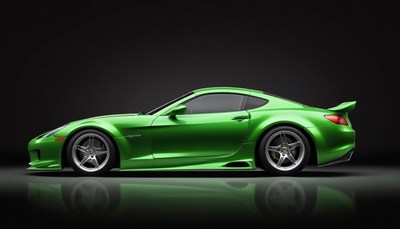 A green sports car is parked on a black surface