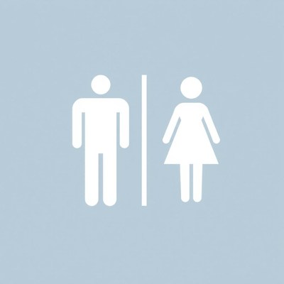 A simple restroom sign with male and female symbols