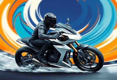 A rider speeds down the road on a sleek motorcycle