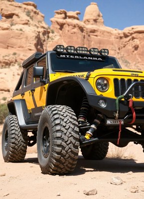 A yellow jeep sits in the desert