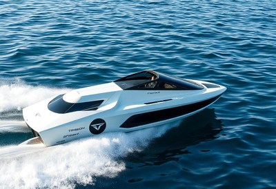 A white speedboat cuts through the water