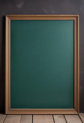 A blank chalkboard with a wood frame sits on a wooden floor