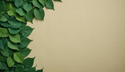 Green leaves frame a beige background