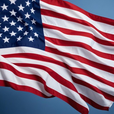 The american flag waves proudly in the wind